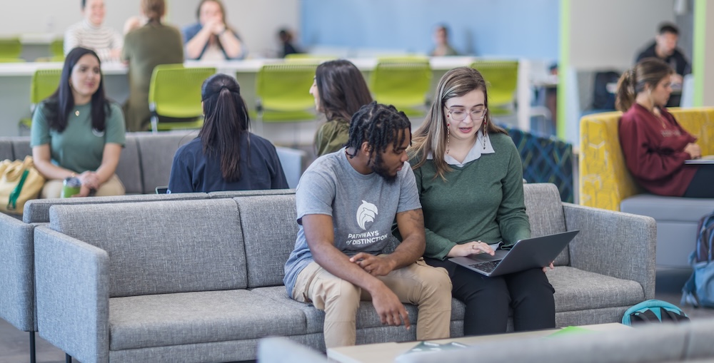 Student studying in Kinne Center