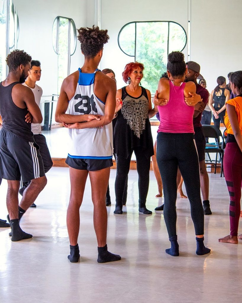 dancers standing and listening