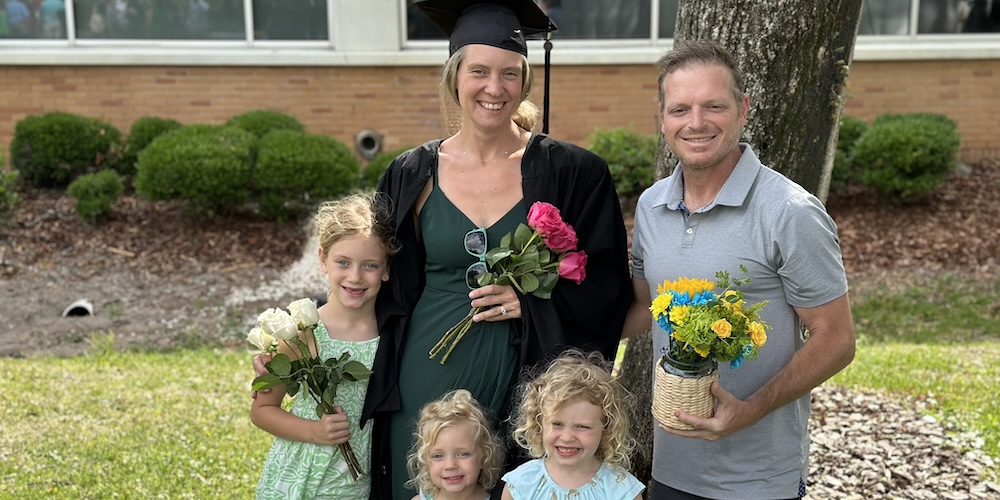 Kate with family at graduation