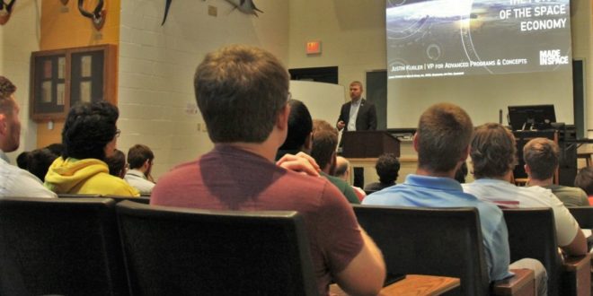 Justin Kugler addresses students