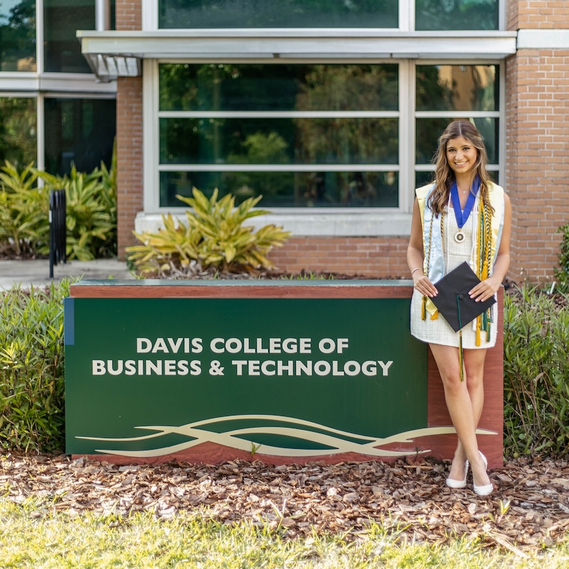 Taylor outside Davis College