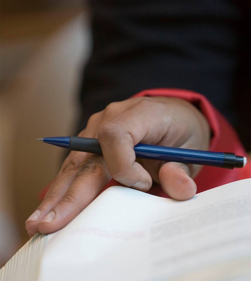 Student using textbook