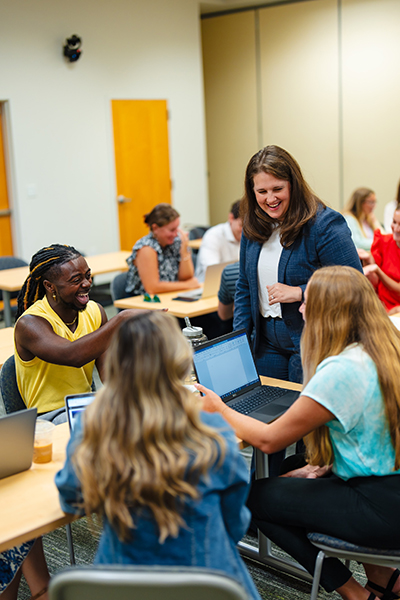 Students in discussion with a professor