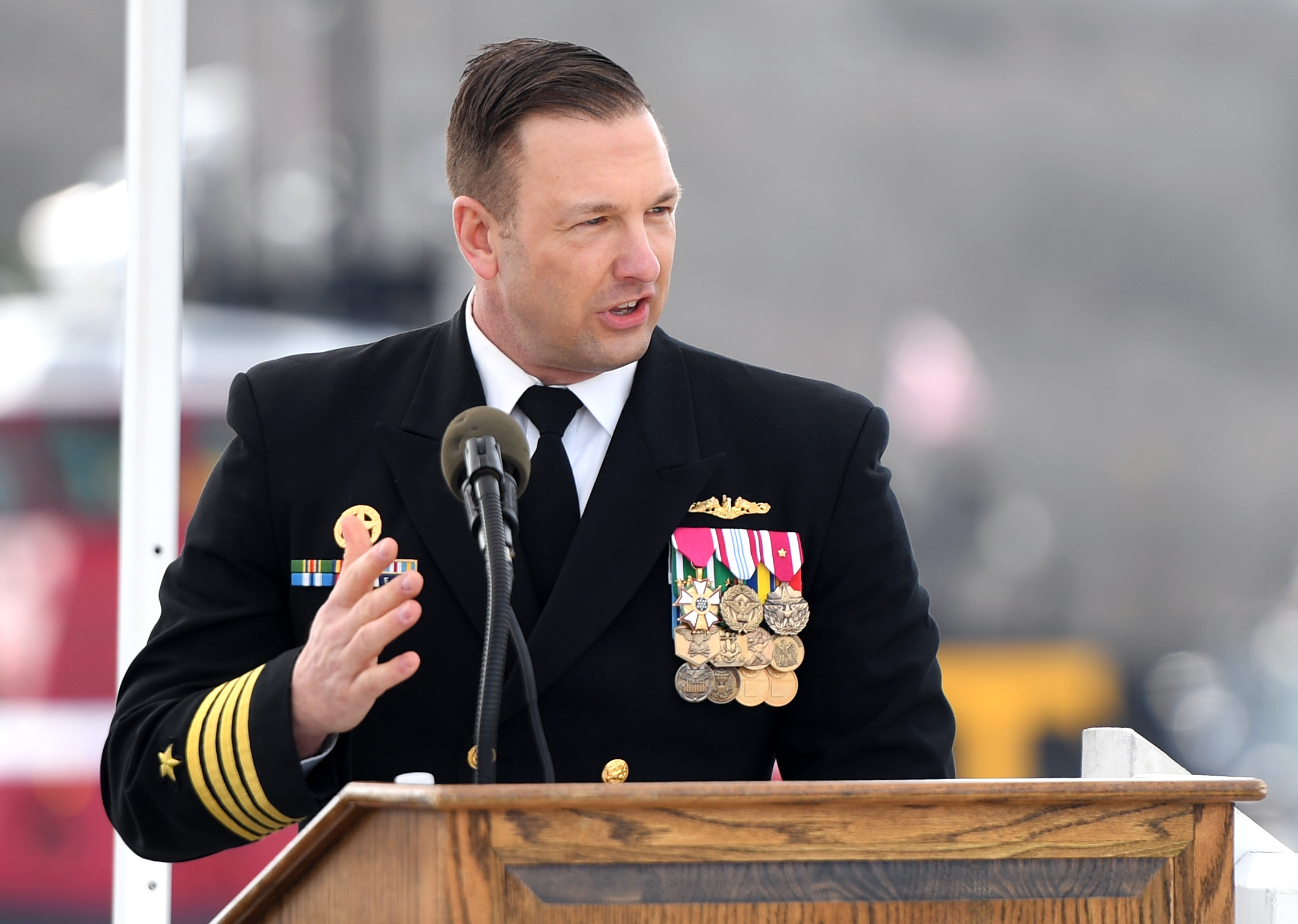 Capt. Phil Castellano at podium