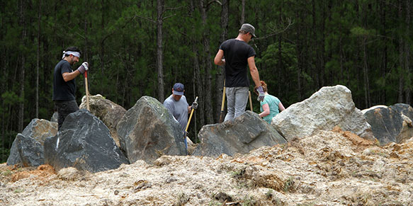 MFA Students creating land art at White Oak Conservation Center.