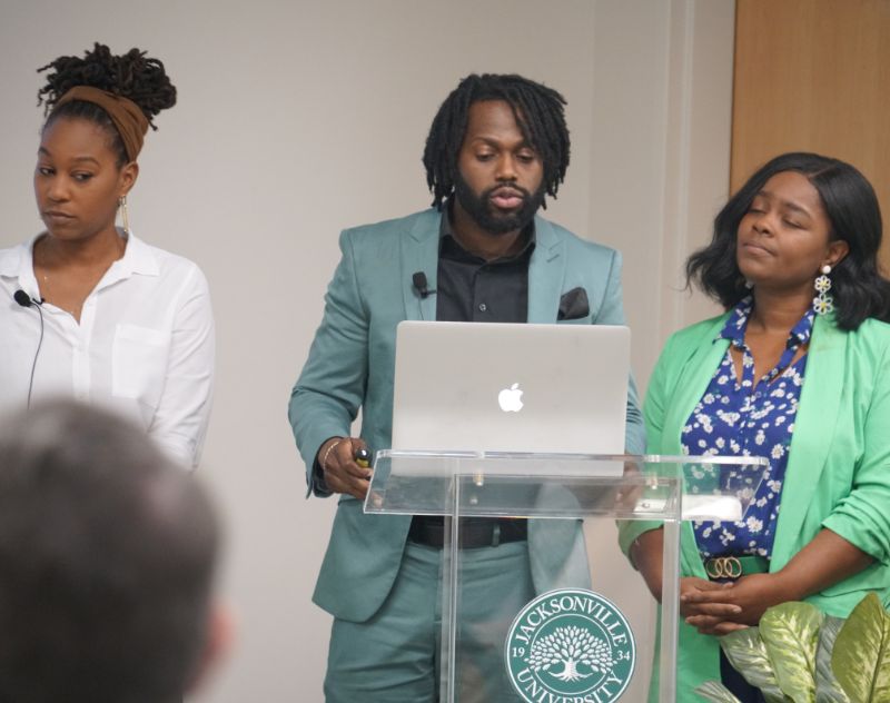 The members of Greenlining Jax, presenting their ideas for a Tree Canopy Project and Leadership Cohort Program.