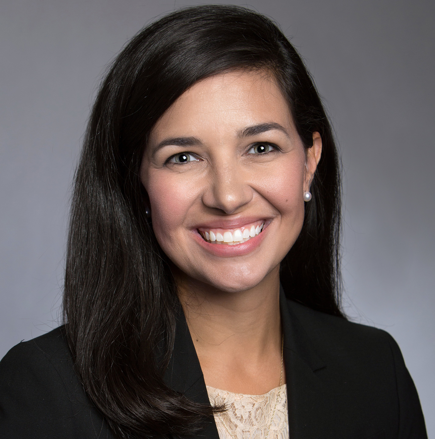 Erica Stem, a female DBA student, smiling for a professional headshot photo.