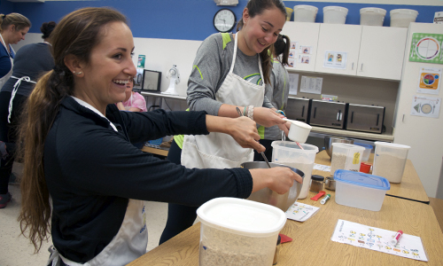 Volunteers sorting food on Charter Day of Service