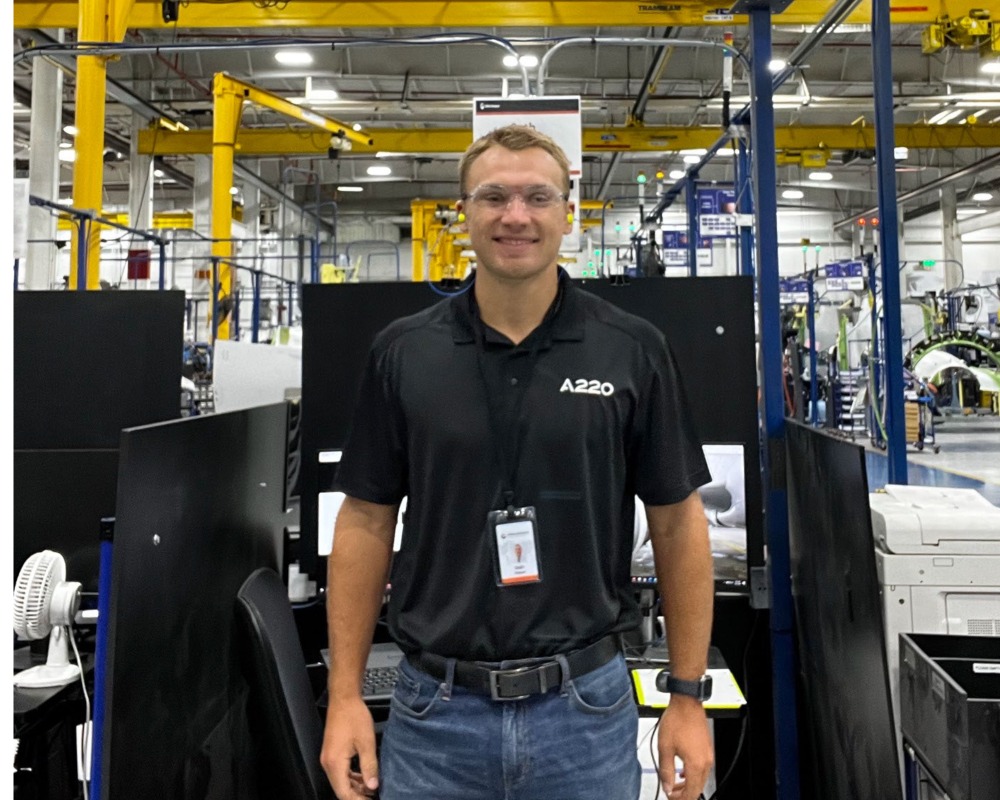 JU student Seth Hogue works on the production line at his internship.