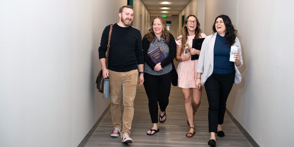 students walking through hallway