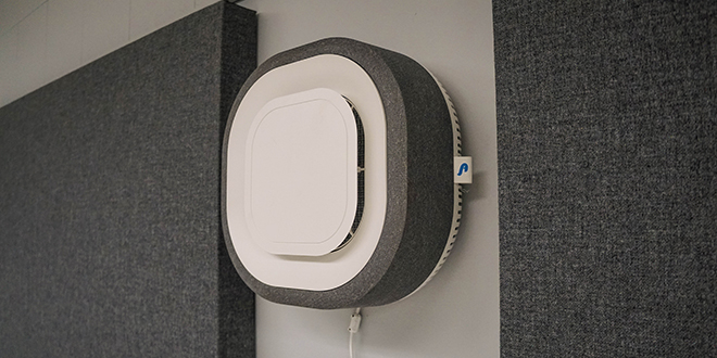 An Auro Air purification system on a wall.