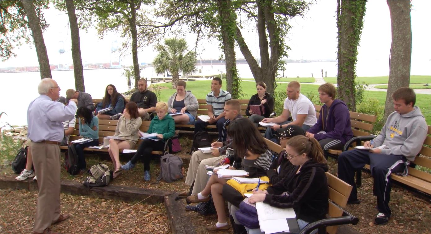 Dr. White teaching in the outdoor classroom.