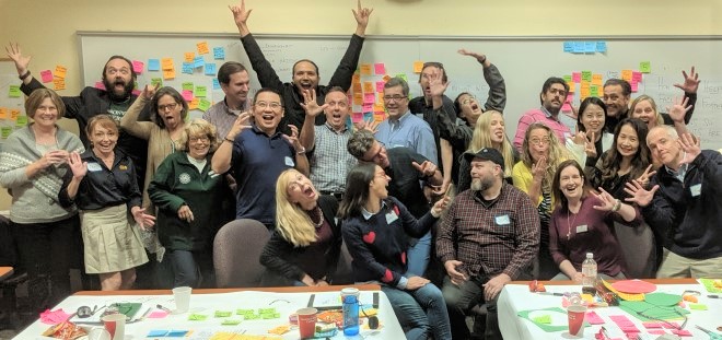 A group of happy students in a classroom. 