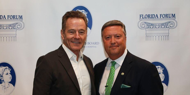 President Tim Cost and Bryan Cranston