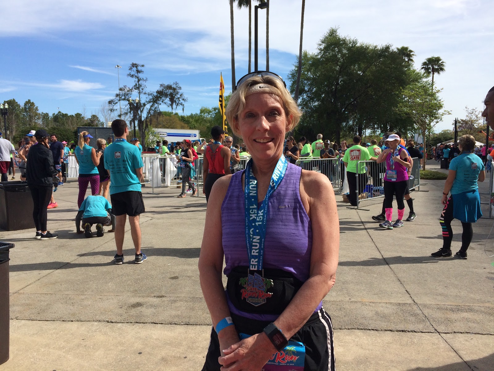 Dr. Teri Chenot after participating in the Gate River Run posing in front of the Jaguars Stadium 