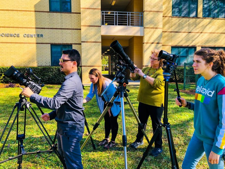 JU Camera Click Club members Savy Dobbs and Renee Franklin with JU Professors at Reid Science Center.