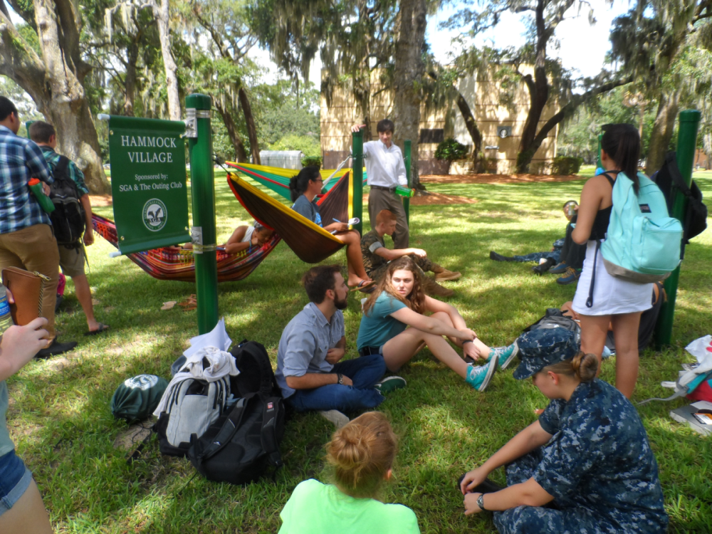 JU students hanging out at Hammock Village on the main Arlington campus