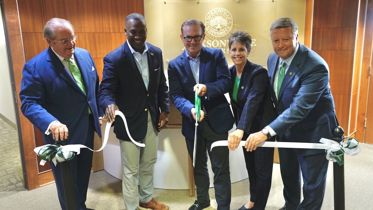 Group cuts the ribbon for the College of Law