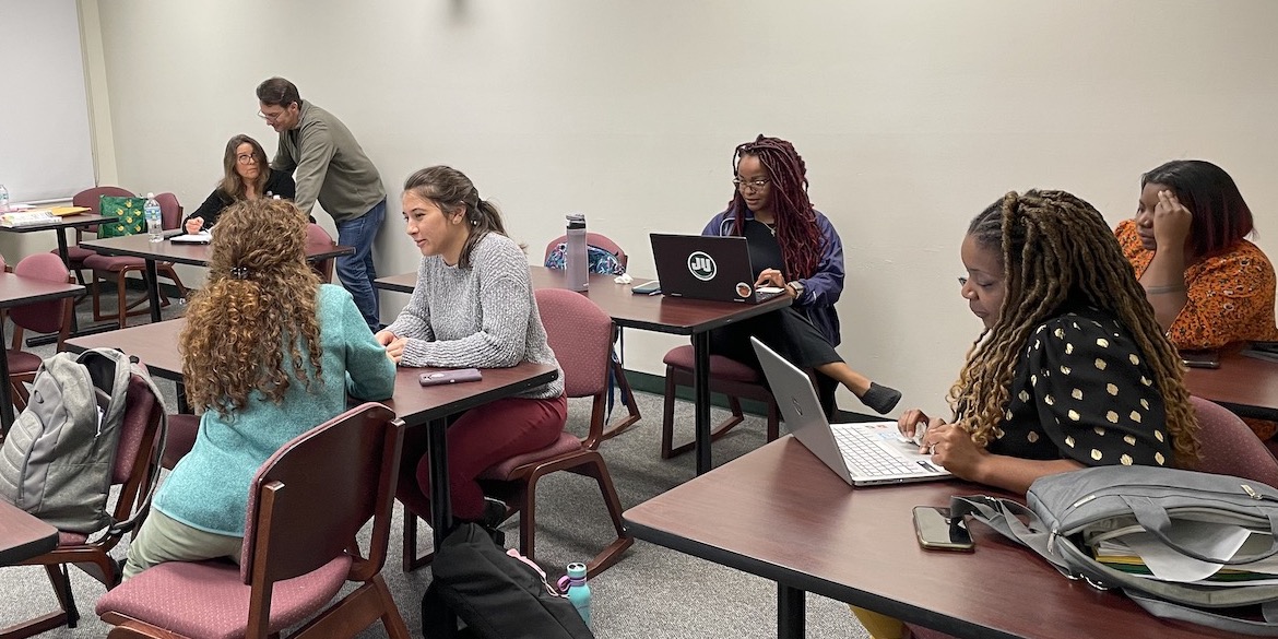 Students in a Master of Science of Leadership and Learning course