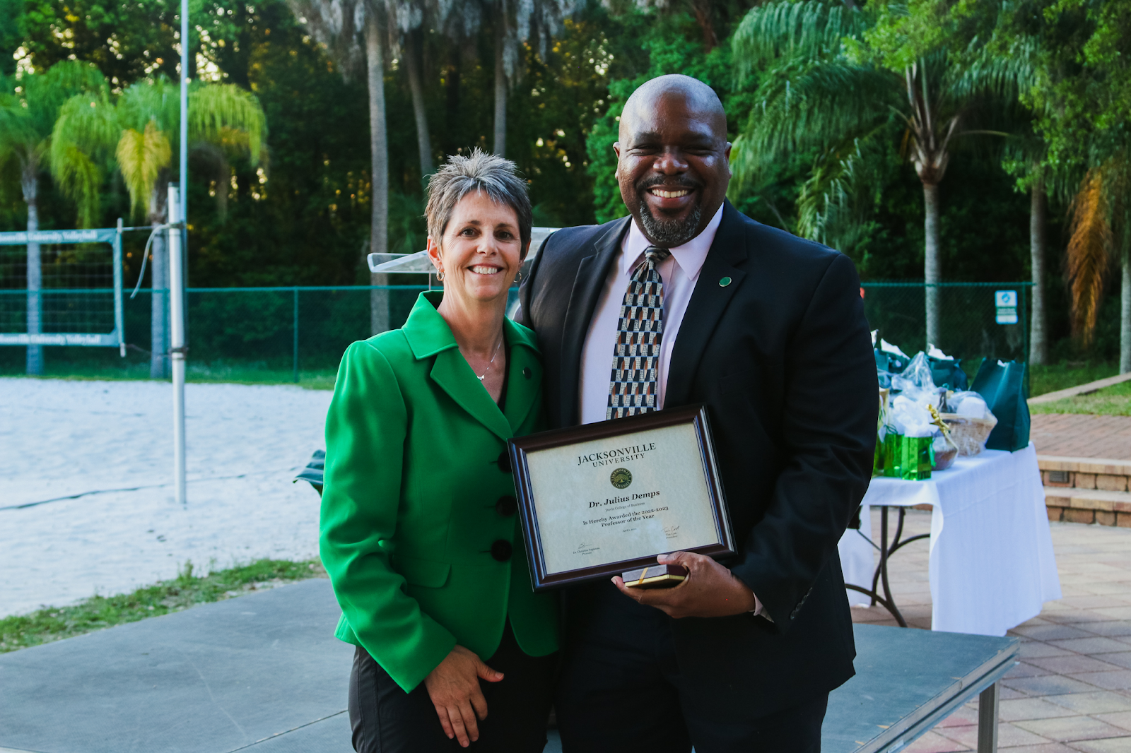 Dr. Demps (right) is recognized with the 2022-2023 Professor of the Year award. Photo by Taylor Sloan.