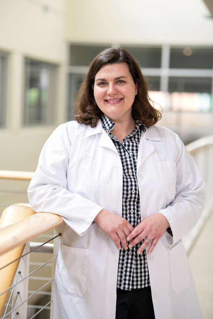 A nursing student looking at the camera for a photo.