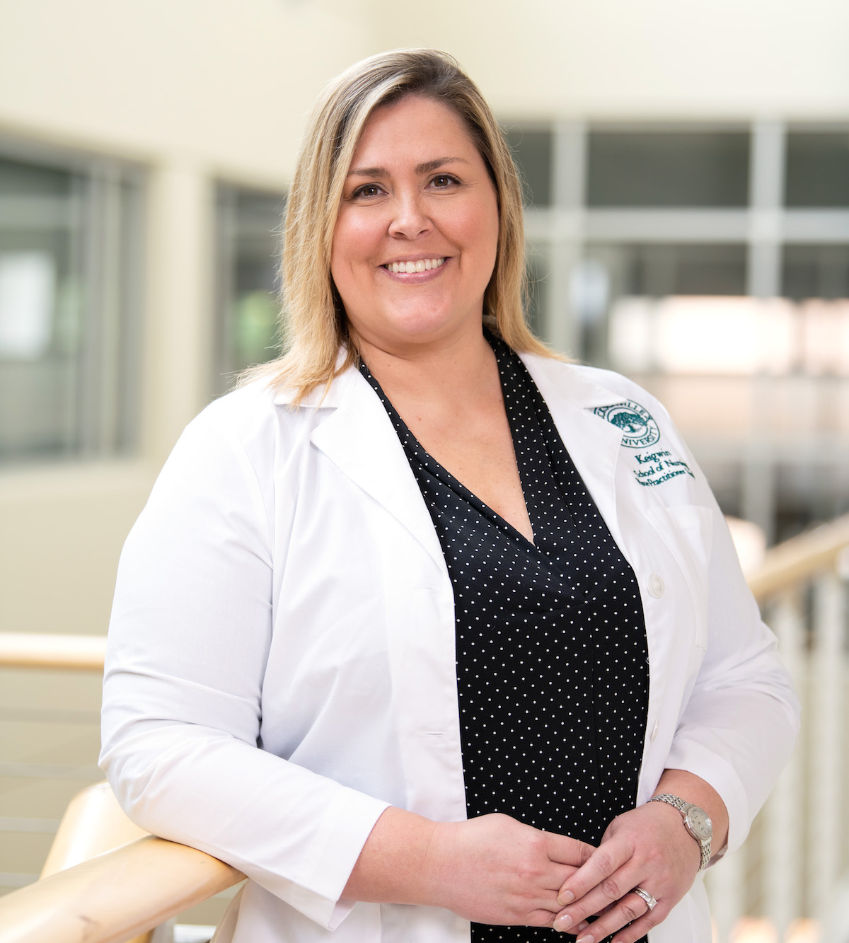 A nursing student looking at the camera for a photo.