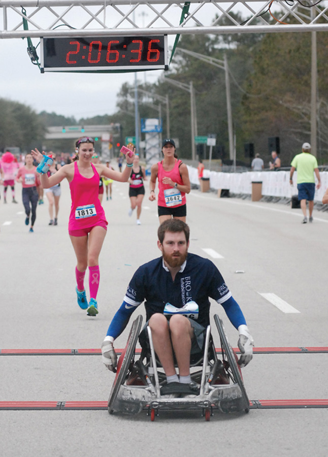 Man in wheelchair in race